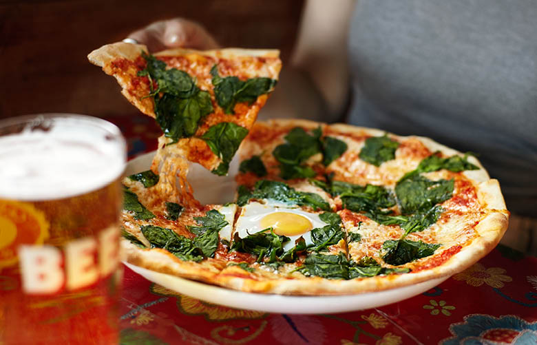 Camden Market food - Proud pizza with fried egg and beer